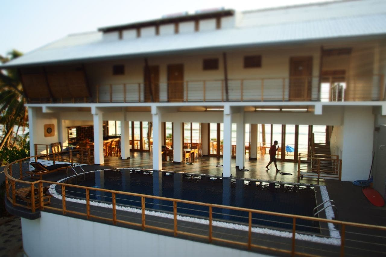 The Seascape hotel and pool at sunset